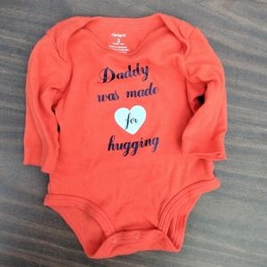 Carter's orange baby onsie.. size 3 months.🧡